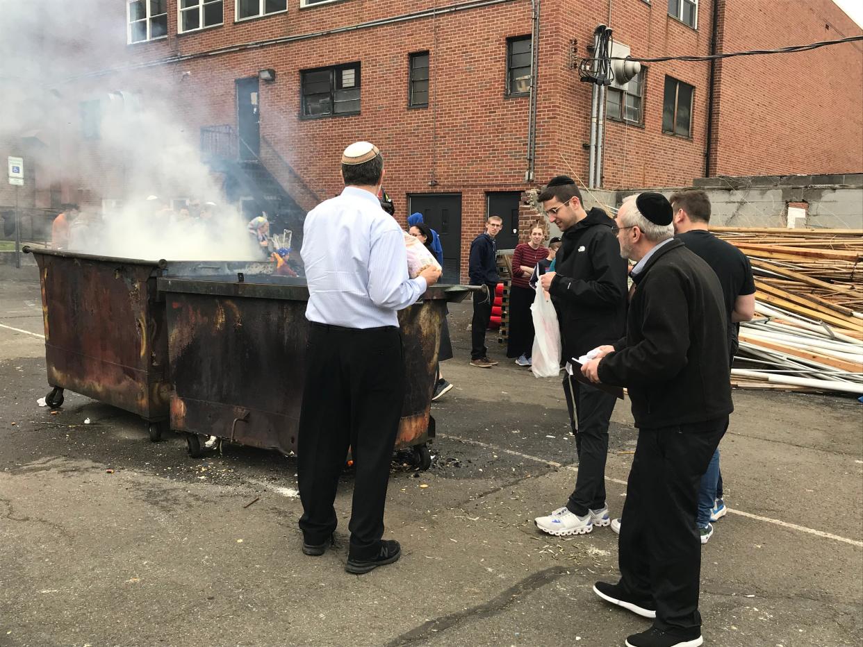 Jews burn chametz before Passover at the Teaneck Jewish Center on  Wednesday, April 5, 2023.