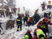 Italian Mountain Rescue Corps "Corpo Nazionale Soccorso Alpino e Speleologico" shows Soccorso Alpino volunteers and rescuers at work in the area of the avalanche-struck Hotel Rigopiano, near Farindola, central Italy, late Sunday, Jan. 22, 2017. (Corpo Nazionale Soccorso Alpino e Speleologico/ANSA via AP)