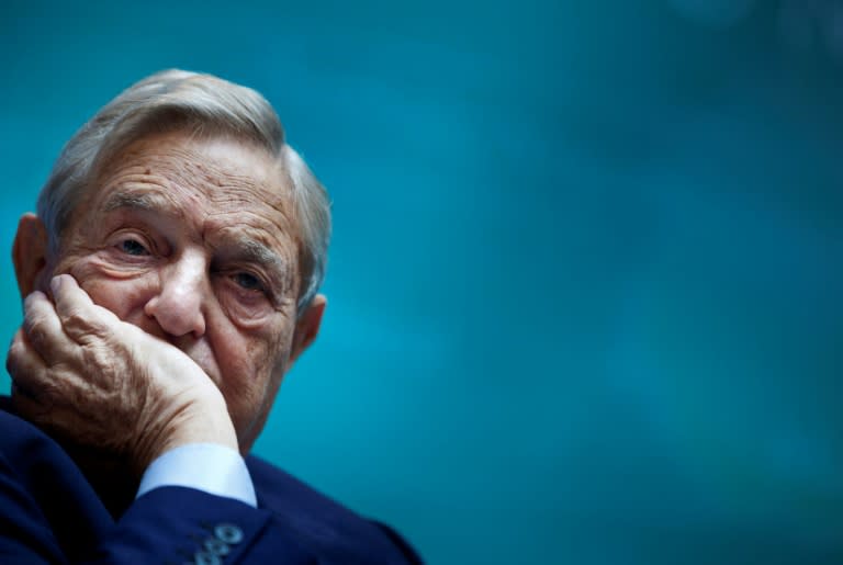 US billionaire George Soros, seen here in 2011, was allegedly involved in efforts to overthrow the president of Equatorial Guinea, a former British mercenary has told a Paris court