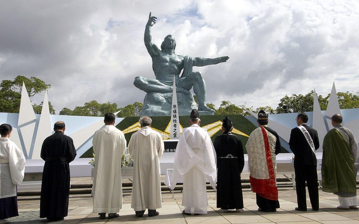 Priests from several religions pray for the victims of the atomic bomb in Nagasaki upon the 60th anniversary. <a href="https://www.gettyimages.com/detail/news-photo/priests-from-a-variety-of-religions-pray-for-the-victims-of-news-photo/53347778?adppopup=true" rel="nofollow noopener" target="_blank" data-ylk="slk:Koichi Kamoshida/Getty Images;elm:context_link;itc:0;sec:content-canvas" class="link ">Koichi Kamoshida/Getty Images</a>