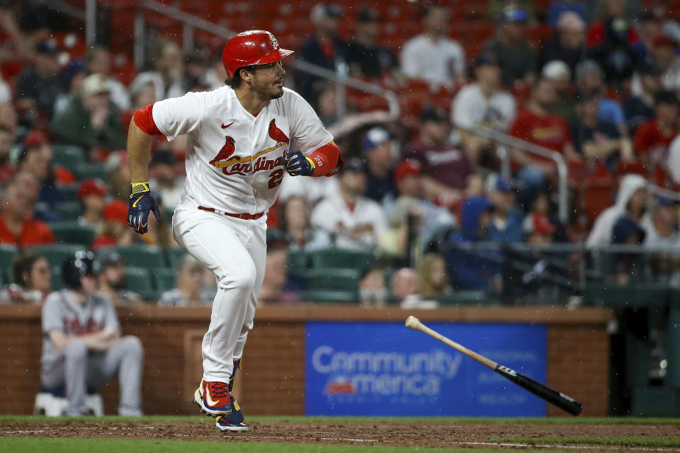 St. Louis Cardinals' Nolan Arenado heads to first on a single against the Atlanta Braves during the eighth inning of a baseball game Tuesday, April 4, 2023, in St. Louis. (AP Photo/Scott Kane)