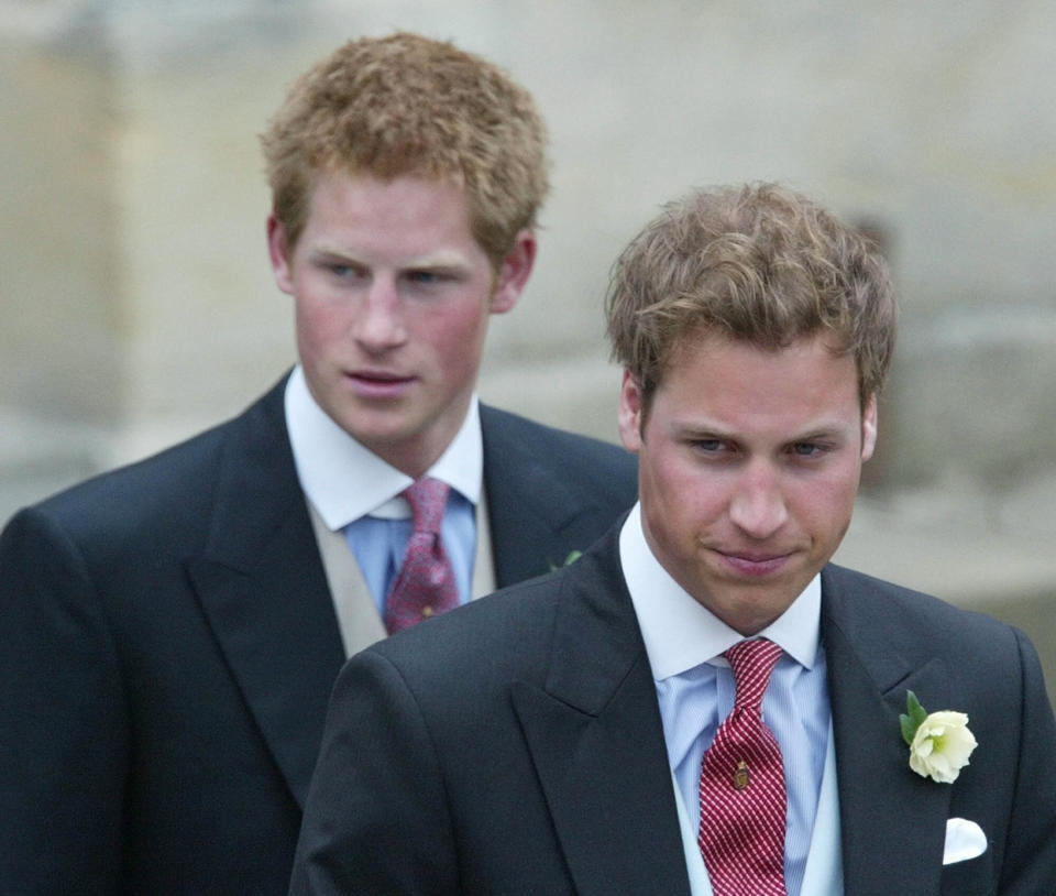 FILE - Britain's Prince William, right, and Prince Harry, left, after the marriage of their father Britain's Prince Charles, the Prince of Wales, and his wife Camilla, the Duchess of Cornwall, at the Guildhall in Windsor, England, after their civil wedding ceremony, on April 9, 2005. An explosive memoir reveals many facets of Prince Harry, from bereaved boy and troubled teen to wartime soldier and unhappy royal. From accounts of cocaine use and losing his virginity to raw family rifts, “Spare” exposes deeply personal details about Harry and the wider royal family. It is dominated by Harry's rivalry with brother Prince William and the death of the boys’ mother, Princess Diana in 1997. (AP Photo/Dave Caulkin, File)