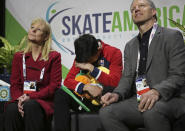 Vincent Zhou waits for his results after his men's free skating program at Skate America, Saturday, Oct. 20, 2018, in Everett, Wash. (Olivia Vanni/The Herald via AP)