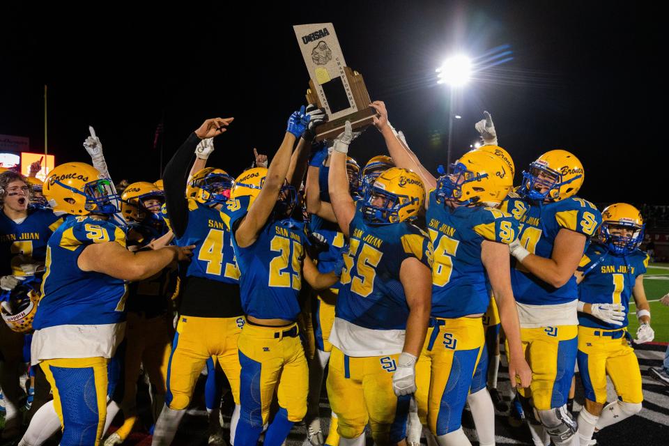 San Juan High School celebrates their championship win over South Summit High School in the 2A football state championship at Southern Utah University in Cedar City on Saturday, Nov. 11, 2023. | Megan Nielsen, Deseret News