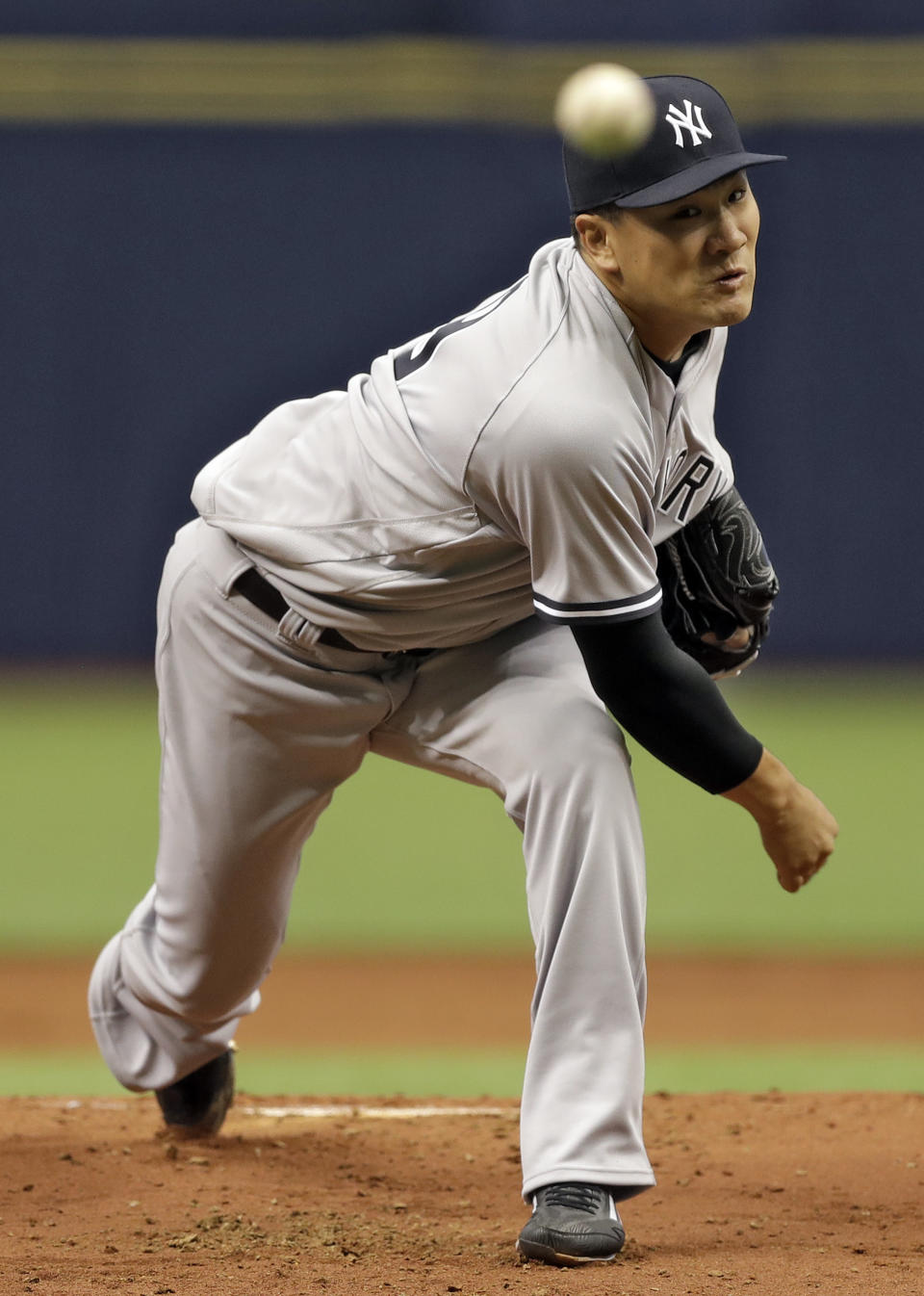 New York Yankees starting pitcher Masahiro Tanaka, of Japan, delivers to the Tampa Bay Rays during the first inning of a baseball game Sunday, April 2, 2017, in St. Petersburg, Fla. (AP Photo/Chris O'Meara)