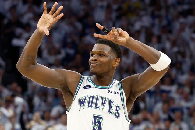 <p>David Berding/Getty </p> Anthony Edwards celebrates against the Denver Nuggets during the fourth quarter in Game Six of the Western Conference Second Round Playoffs on May 16, 2024 in Minneapolis, Minnesota.