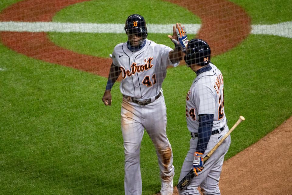 Detroit Tigers right fielder Daz Cameron (41) celebrates with designated hitter Miguel Cabrera after scoring a run in the seventh inning against the Minnesota Twins at Target Field, Sept. 22, 2020.