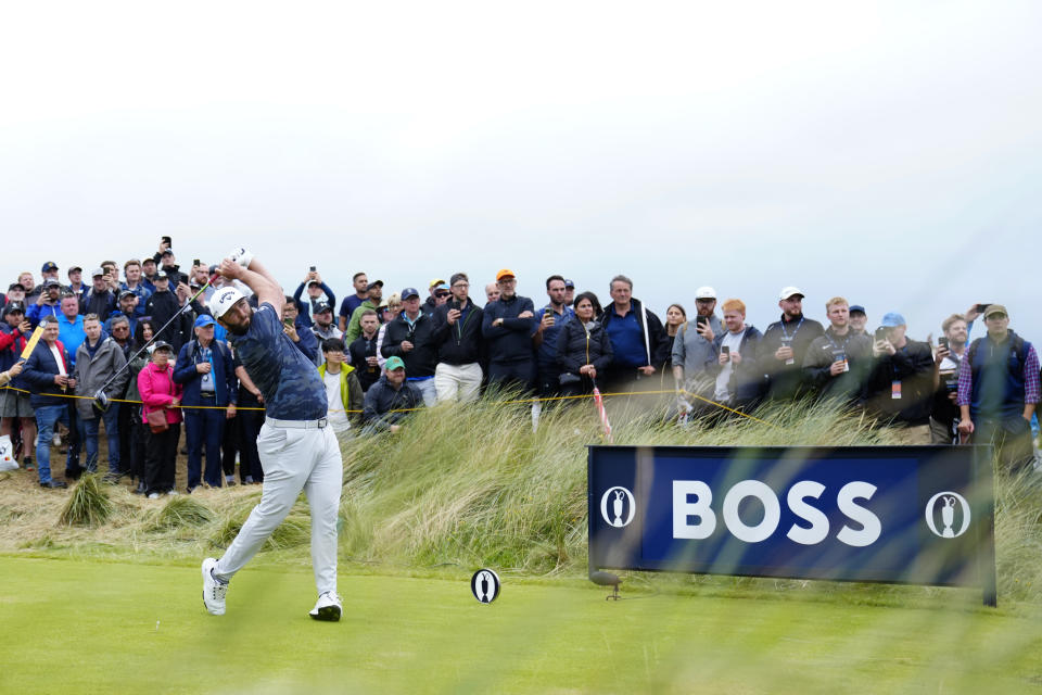 Spain's Jon Rahm drives off the 14th tee during the third day of the British Open Golf Championships at the Royal Liverpool Golf Club in Hoylake, England, Saturday, July 22, 2023. (AP Photo/Jon Super)