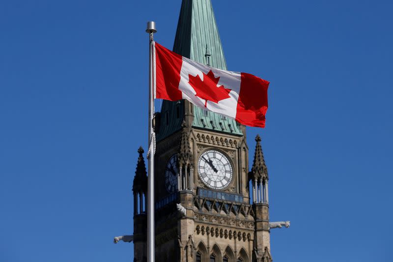 FILE PHOTO: Canadian flag flies in front of the Peace Tower on Parliament Hill in Ottawa