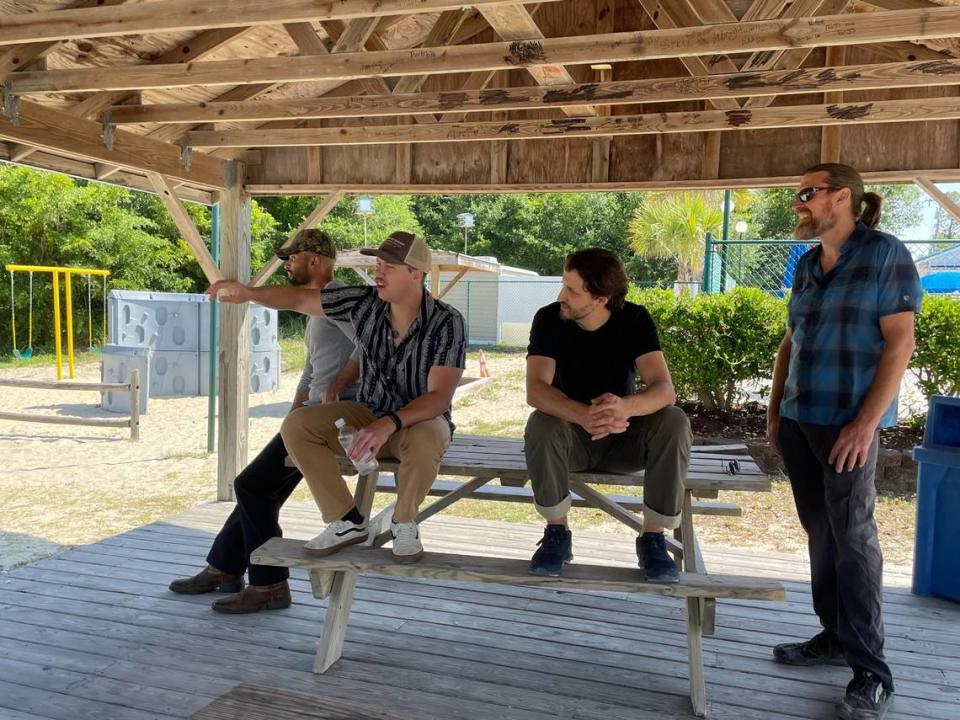 Luke Lowder, center, shows areas of Apache Family Campground and Pier to, from left, Isaiah Wolfe, Dustin Whitehead and Matthew Robert Perry. Whitehead is the producer of Lowder’s new movie, “The Grand Strand,” which will be filmed in Myrtle Beach. Wolfe and Perry will also be working on the film.