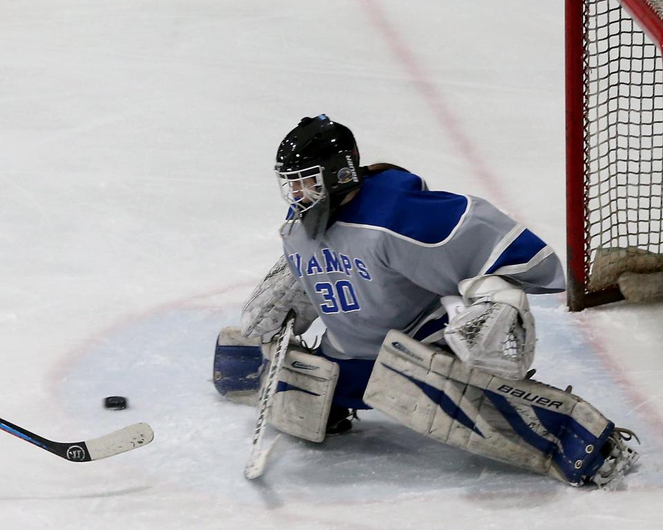 Braintree goalie Eva Surette makes the save during second period action of their game in the round of 32 in the Division 2 state tournament at Zapustas Ice Arena in Randolph on Thursday, March 3, 2022. 