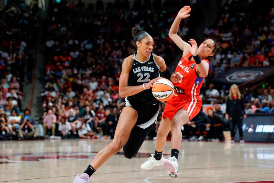Las Vegas Aces’ A’ja Wilson drives past Puerto Rican National’s Isalys Quinones during the exhibition game at the Colonial Life Arena on Saturday May 11, 2024.
