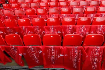 Football Soccer - Manchester United v Everton - Barclays Premier League - Old Trafford - 3/4/16 Tributes placed on seats to mark the 60th anniversary of the debut of Sir Bobby Charlton before the game Action Images via Reuters / Jason Cairnduff Livepic EDITORIAL USE ONLY.