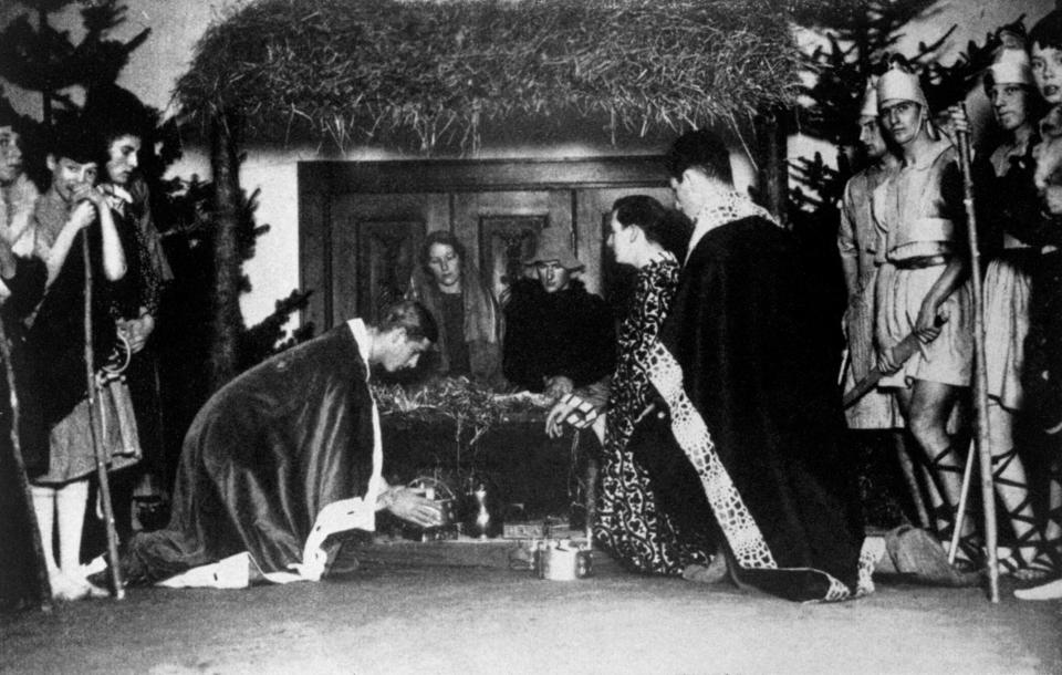 Prince Philip of Greece (centre left, kneeling) performs as King Melchior in a nativity play at his public school, Gordonstoun, Elgin, Scotland.   (Photo by PA Images via Getty Images)