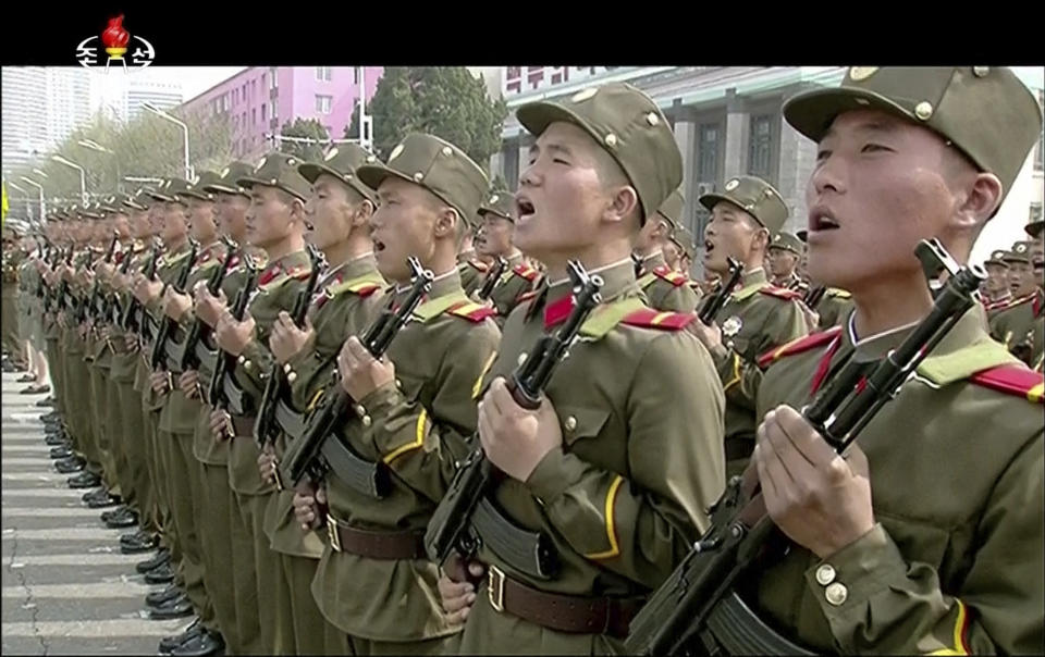 In this image made from video broadcast by North Korean broadcaster KRT, soldiers take part in a parade at Kim Il Sung Square in Pyongyang, Saturday, April 15, 2017. North Korean leader Kim Jong Un has appeared in a massive parade in the capital, Pyongyang, celebrating the birthday of his late grandfather and North Korea founder Kim Il Sung. (KRT via AP)