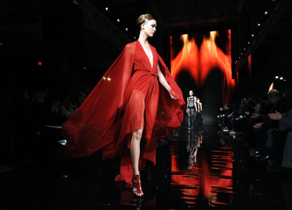 The Donna Karan New York Fall 2014 collection is modeled during Fashion Week, Monday, Feb. 10, 2014, at 23 Wall Street in New York. (AP Photo/Diane Bondareff)