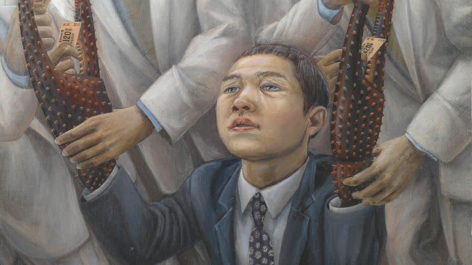 Another painting entitled "Gripe," painted by Ishidia in 1996, portrays a Japanese salaryman with lobster claws for hands. - Martin Wong/Courtesy Gagosian
