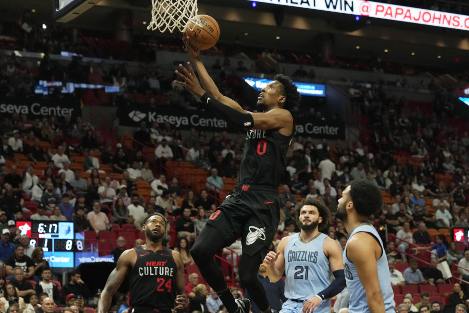 Miami Heat guard Josh Richardson (0) drives to the basket during the first half of an NBA basketball game against the Memphis Grizzlies, Wednesday, Jan. 24, 2024, in Miami. (AP Photo/Marta Lavandier)