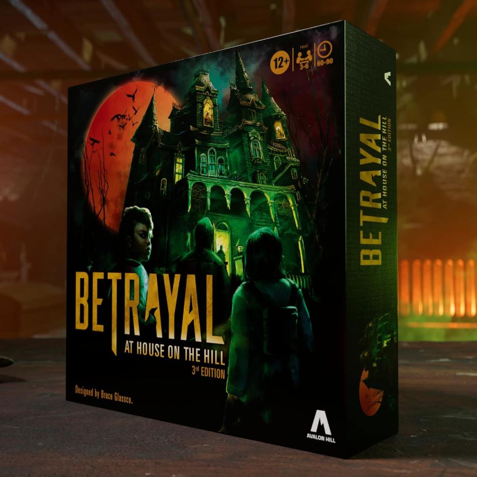 betrayal board game for adults box with graphic of haunted house