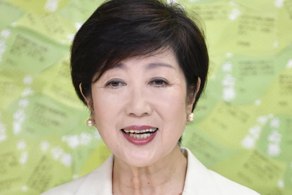 Tokyo Gov. Yuriko Koike speaks at a news conference after winning a second term to head the Japanese capital, in Tokyo Sunday, July 5, 2020. (Kyodo News via AP)