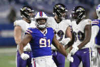 Buffalo Bills defensive tackle Ed Oliver (91) celebrates after stopping Baltimore Ravens' J.K. Dobbins in the backfield during the second half of an NFL divisional round football game Saturday, Jan. 16, 2021, in Orchard Park, N.Y. (AP Photo/Adrian Kraus)