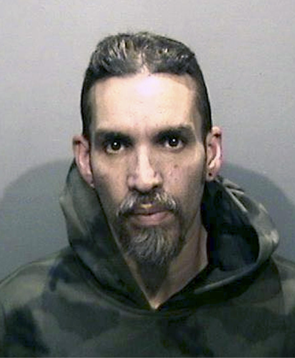 FILE - This Monday, June 5, 2017, file photo released by the Alameda County Sheriff's Office shows Derick Almena at Santa Rita Jail in Alameda County, Calif. Almena awaiting retrial in a fire that killed 36 partygoers at a San Francisco Bay Area warehouse was released from jail Monday, May 4, 2020, because of the coronavirus outbreak. Almena, 50, was released from the Santa Rita Jail after a teleconference hearing Monday, the Alameda County Sheriff's office said. (Alameda County Sheriff's Office via AP, File)