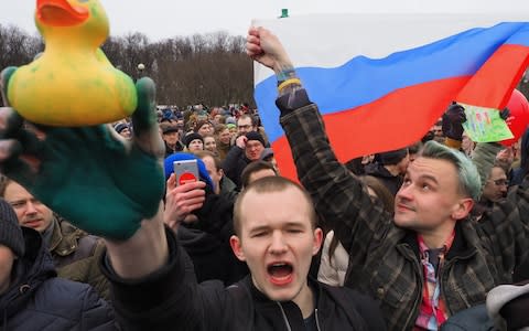 Young protesters at the March 26 protest in St Petersburg sparked by Alexei Navalny's viral video about government corruption - Credit: Alexander Petrosyan/Kommersant via Getty Images