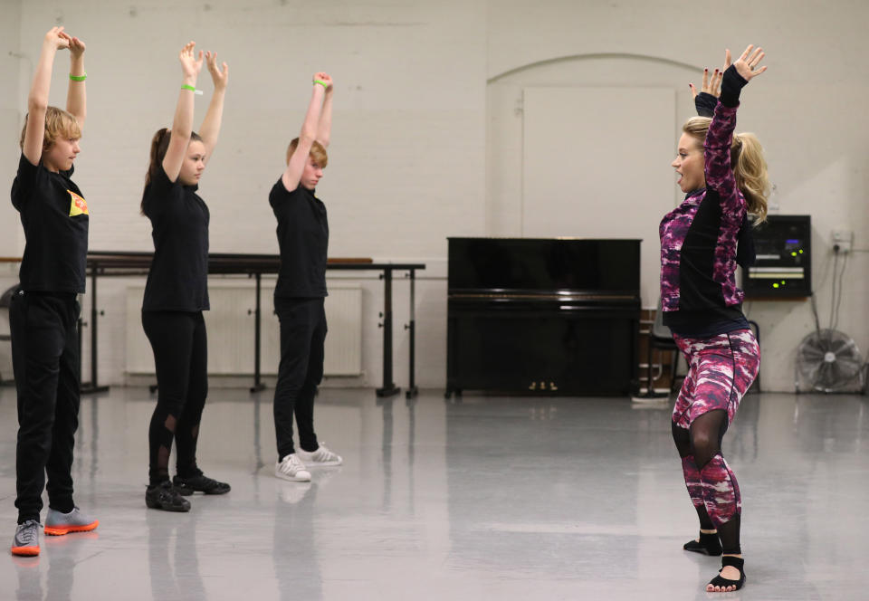 Kimberly Wyatt teaches young dancers from Stagecoach a routine during a launch event for her new book 'Billie's Big Audition', at Pineapple Dance Studios in London.