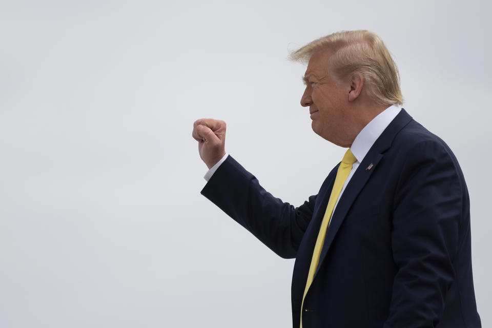 US President Donald Trump gestured as he arrives in Orlando, Florida, on March 9, 2020. - Wall Street stocks were decisively lower at mid-morning Monday as mounting worries over the coronavirus and sinking oil prices led to a temporary halt in trading. US President Donald Trump weighed in, tweeting "Good for the consumer, gasoline prices coming down!" and blaming the market turmoil on a dispute between Saudi Arabia and Russia. (Photo by JIM WATSON / AFP) (Photo by JIM WATSON/AFP via Getty Images)