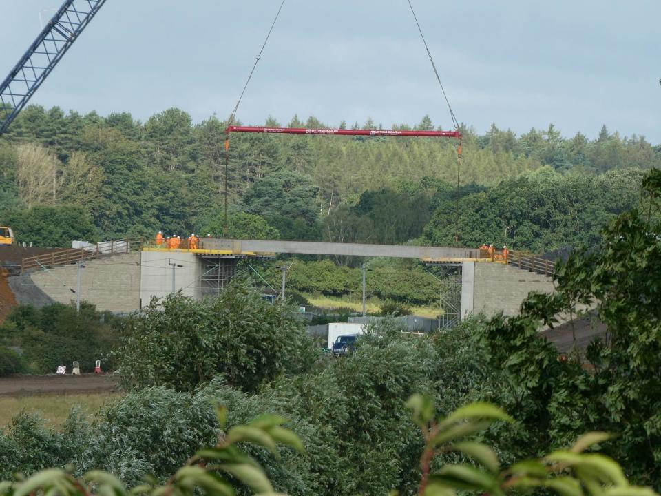 Latest stage of construction shows a bridge being installed linking two piers near Kentstone Close, Kingsthorpe (Photo: Richard Abbott)