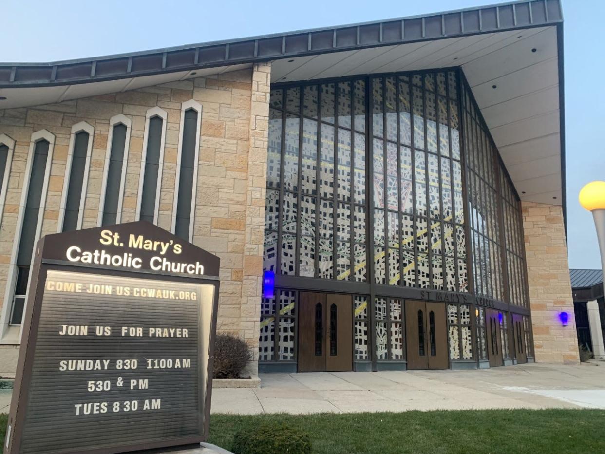 The main entrance to St. Mary's Catholic Church along Newhall Avenue near Hartwell Avenue includes some of the architectural details that historians noted in their support for placing the complex on the National Register of Historic Places. "The 1960s Contemporary church architecture exhibits Lannon stone and stain glass with a soaring overhanging roofline that shelters the faceted and mosaic glass," the Wisconsin Historical Society said in announcing the church's inclusion on the list.