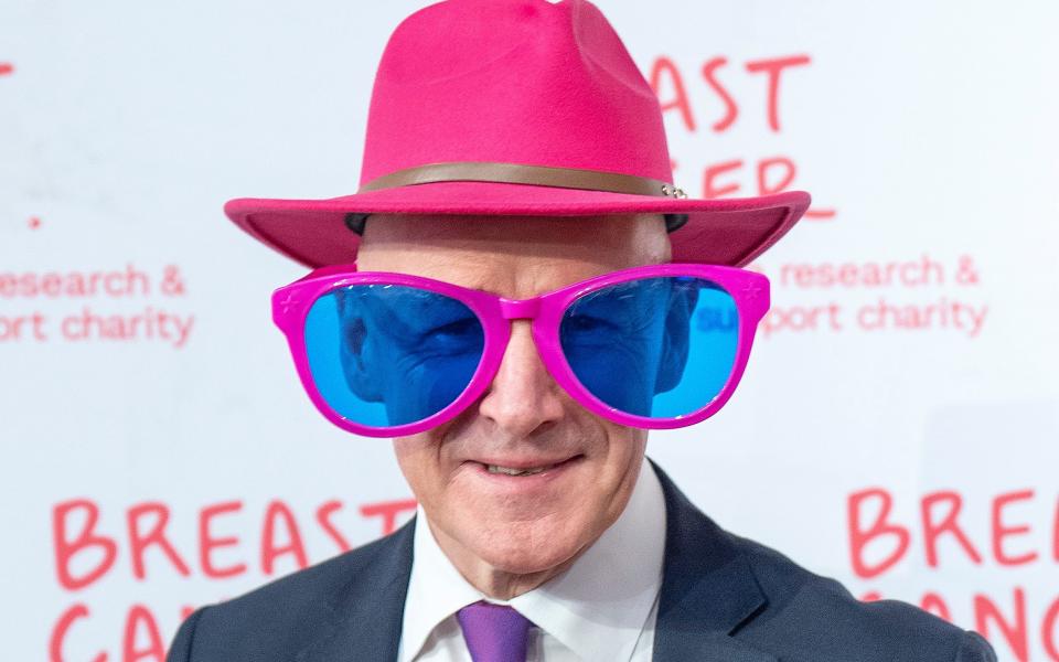 Scottish First Minister John Swinney shows his support for the 'Wear It Pink' campaign organised by Breast Cancer Now, at the Scottish Parliament in Holyrood, Edinburgh