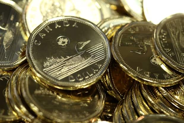 The loonie hit 82 cents US on Thursday, a level it has not topped since 2017. (Shannon VanRaes/Bloomberg - image credit)