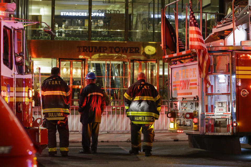 Firefighters at Trump Tower on April 7 in Manhattan. Six firefighters were injured battling the&nbsp;blaze that broke out on the 50th floor. (Photo: Eduardo Munoz Alvarez via Getty Images)