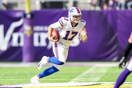 Sep 23, 2018; Minneapolis, MN, USA; Buffalo Bills quarterback Josh Allen (17) carries the ball during the second quarter against Minnesota Vikings at U.S. Bank Stadium. Mandatory Credit: Brace Hemmelgarn-USA TODAY Sports