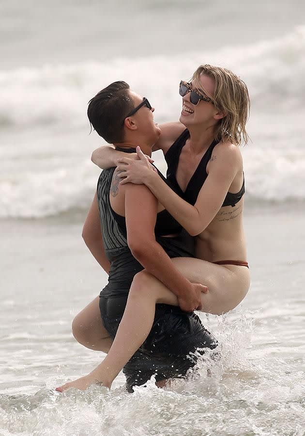 Alex and Maegan frolic in the ocean. Source: Diimex