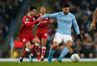 Soccer Football - Carabao Cup Semi Final First Leg - Manchester City vs Bristol City - Etihad Stadium, Manchester, Britain - January 9, 2018 Manchester City's Sergio Aguero in action with Bristol City's Liam Walsh REUTERS/Andrew Yates