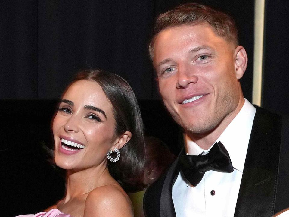 <p>Kevin Mazur/VF22/WireImage</p> Olivia Culpo and Christian McCaffrey.