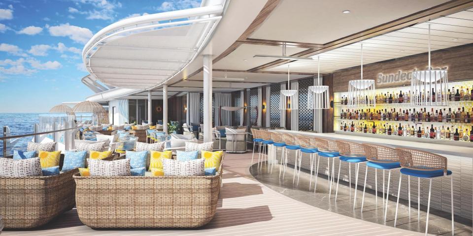 a rendering of an outdoor lounge area with a bar and seats aboard the Wonder of the Seas