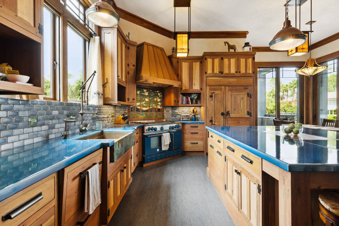 A view of the kitchen, which also features depictions of nature, found within 36 Plumbridge Circle on Hilton Head Island, SC.