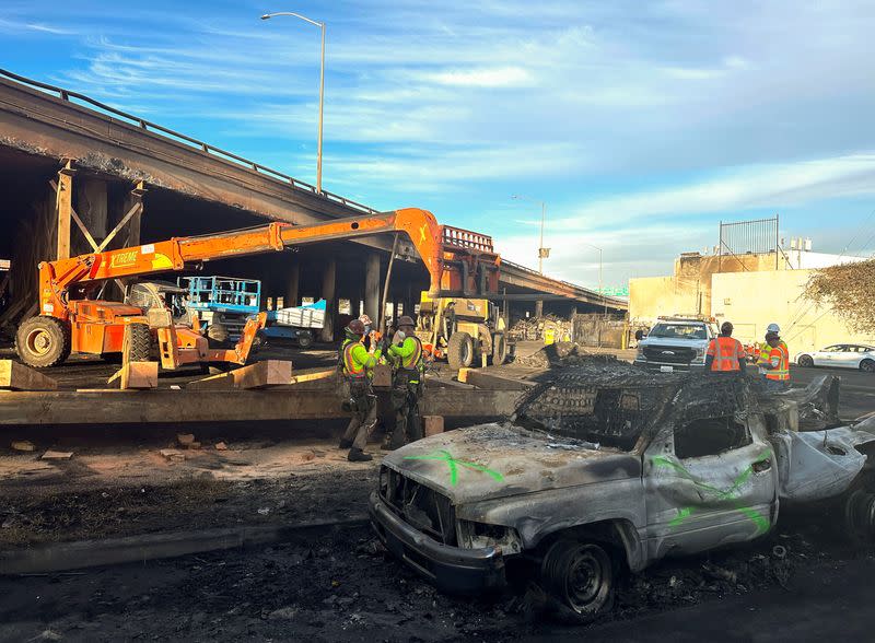 Aftermath of Interstate 10 freeway fire eruption in Los Angeles