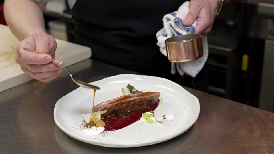 Musket Room executive chef Mary Attea prepares Pekin Duck. / Credit: CBS News