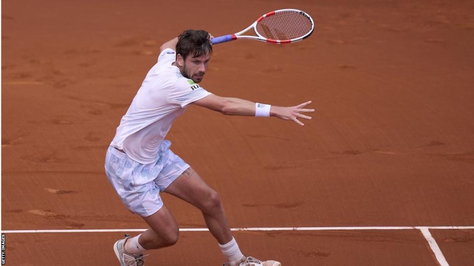 Cameron Norrie plays a shot at the Barcelona Open