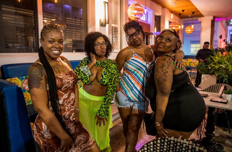 Visitors from Baltimore (left to right) Mel Hoskin, Jasper Woods, Felicia Hughes and Rena Simmons, pose on Saturday, March 26, 2022, at the Chesterfield Hotel, where they arrived late Thursday from Maryland and found they couldn’t walk to a restaurant or bar due to a midnight curfew imposed by the City of Miami Beach for the South Beach area, after two shootings the weekend before, that caused city officials to announce a “state of emergency”.