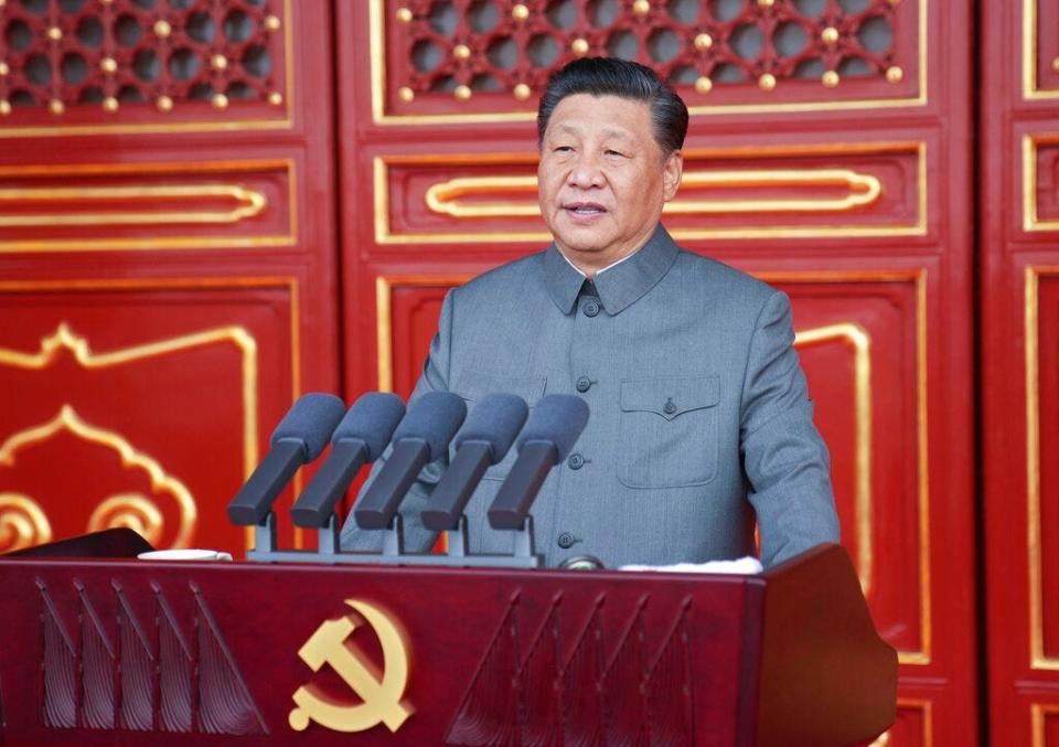 In this photo provided by China's Xinhua News Agency, Chinese President and party leader Xi Jinping delivers a speech at a ceremony marking the centenary of the ruling Communist Party in Beijing on July 1, 2021.