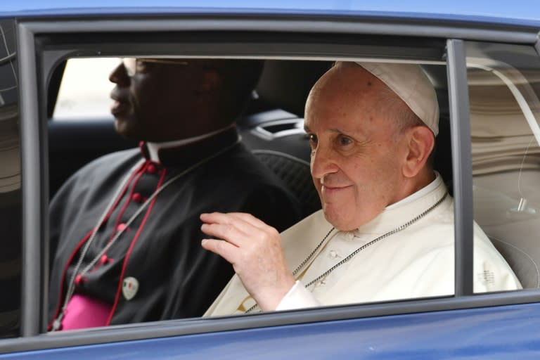 Supporters lined the streets outside Dublin Castle, cheering the pontiff as he waved back from the rear of a modest Skoda