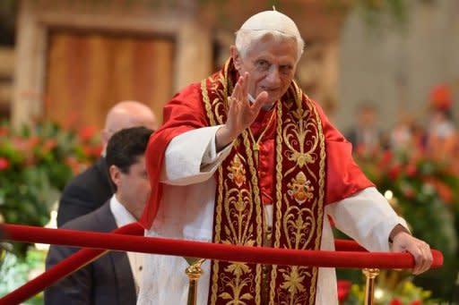 Pope Benedict XVI leaves after leading a ceremony to appoint six new cardinals at St Peter's basilica at the Vatican on Saturday