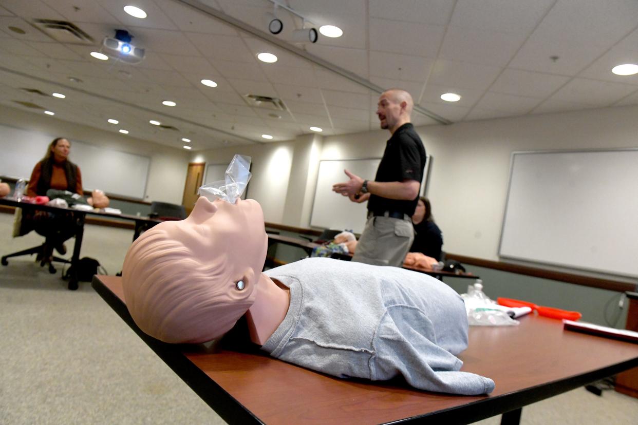 Randy Feesler, also known as The Pulse Provider, teaches a lifesaving class at the American Red Cross offices in Canton.