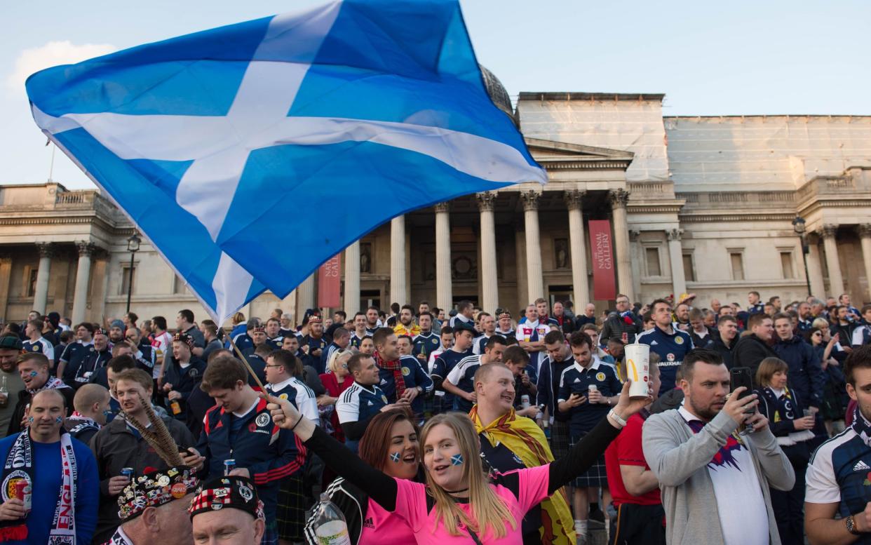 Scotland fans in Trafalgar Square, London, as thousands of football fans descend on the capital for the England v Scotland World Cup qualifier.  -  Stefan Rousseau