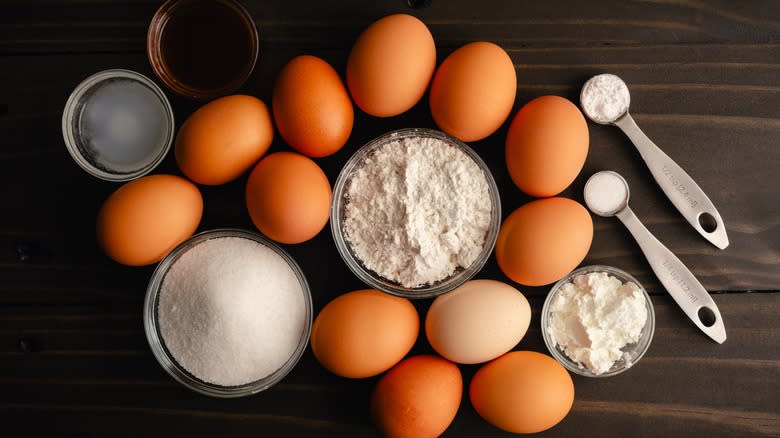 Top-down view of eggs and dry ingredients for angel food cake